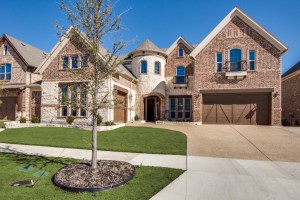 Upgraded Entry on this Windsor Model John R. Landon Signature Home Hip Pocket Listing in Richwoods.  Elevation cost at the time was close to $10,000