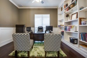 Study with upgraded cabinets and wainscoting.
